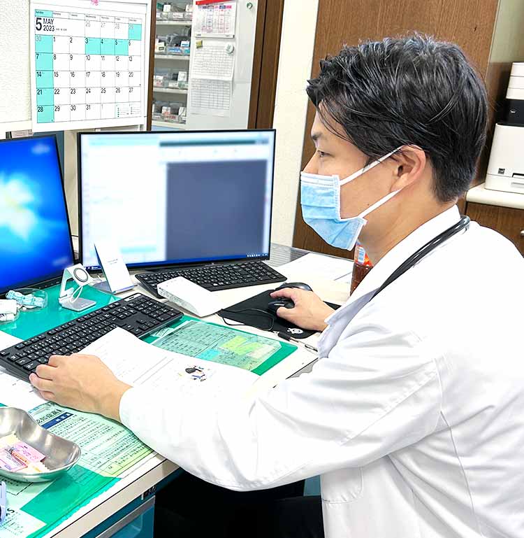 医師 牧尾 健史